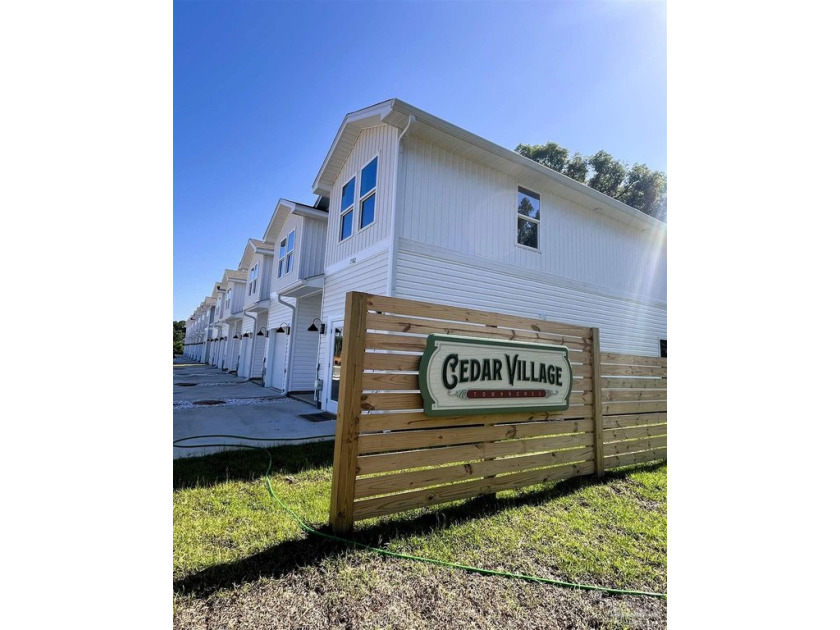 Gorgeous new construction townhomes in Cedar Village! Located in - Beach Home for sale in Pensacola, Florida on Beachhouse.com