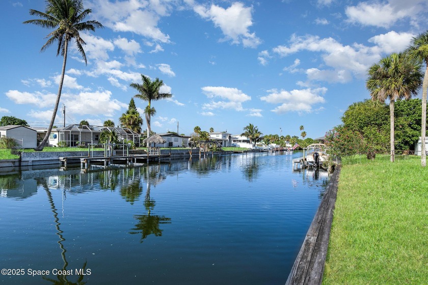 Wow, A MUST SEE!! Gorgeous Canal Front 4 bedroom, 2 Bath with - Beach Home for sale in Merritt Island, Florida on Beachhouse.com