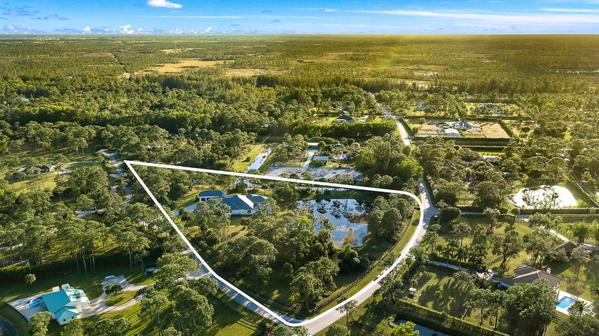 Set across 6.51 acres within a private estate community of - Beach Home for sale in Palm Beach Gardens, Florida on Beachhouse.com