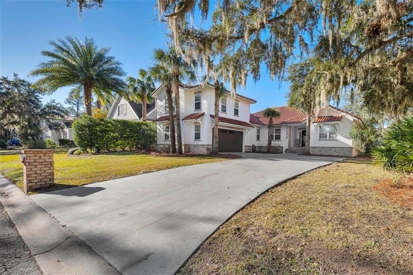 Welcome to this beautifully crafted 4-bedroom, 3-bathroom home - Beach Home for sale in Saint Simons, Georgia on Beachhouse.com