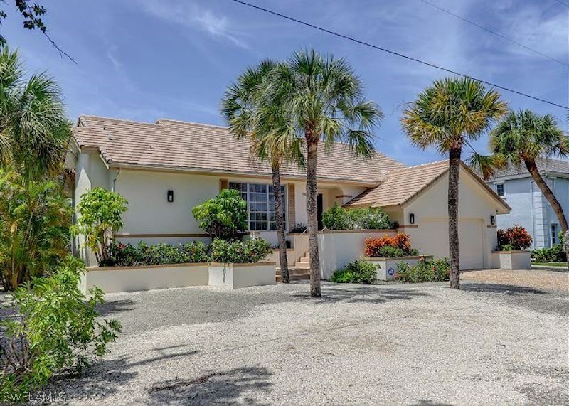 This impeccably maintained near beach home sits on a quiet - Beach Home for sale in Sanibel, Florida on Beachhouse.com