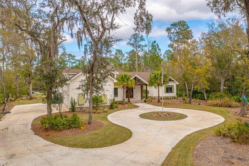 Welcome to your dream home! This meticulously designed 6-bedroom - Beach Home for sale in Saint Simons, Georgia on Beachhouse.com