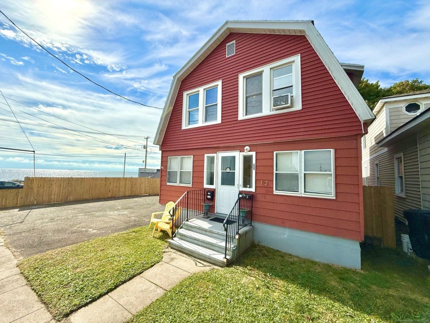 WATERFRONT two-family home located right across the street from - Beach Home for sale in West Haven, Connecticut on Beachhouse.com