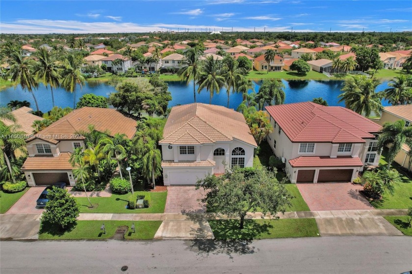 Lovely 4 bed 3 bath waterfront single family house in gated - Beach Home for sale in Miramar, Florida on Beachhouse.com