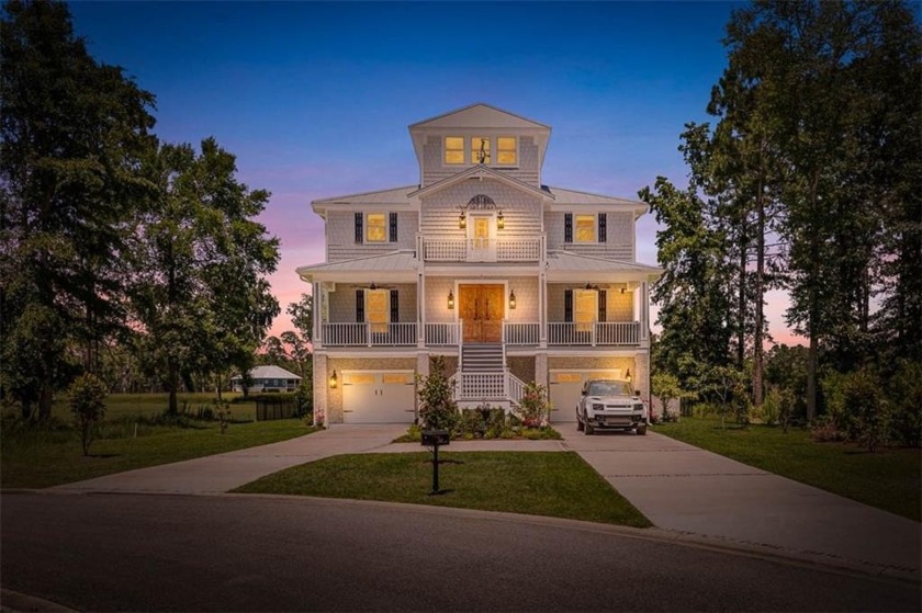 This luxurious multi-level home combines modern conveniences and - Beach Home for sale in Waverly, Georgia on Beachhouse.com