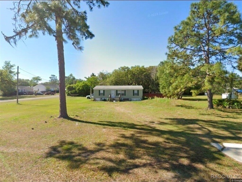 Tranquility awaits on this peaceful 3/4-acre property featuring - Beach Home for sale in Homosassa, Florida on Beachhouse.com