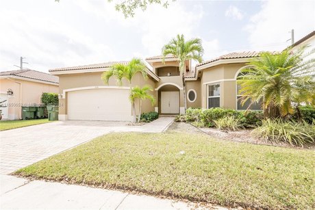 Welcome to your new waterfront home on a double lot! This - Beach Home for sale in Homestead, Florida on Beachhouse.com