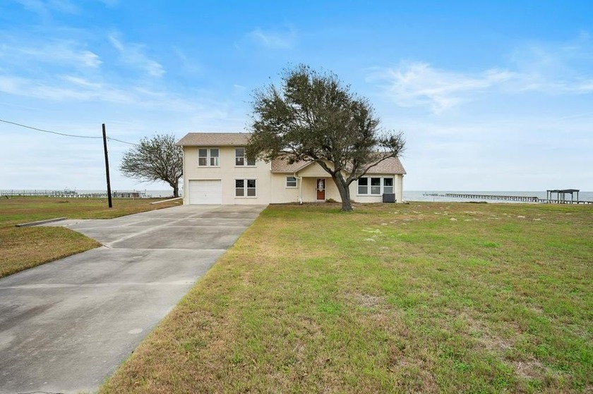 Opportunity knocks with this 3-bedroom, 3-bath bayfront home - Beach Home for sale in Rockport, Texas on Beachhouse.com