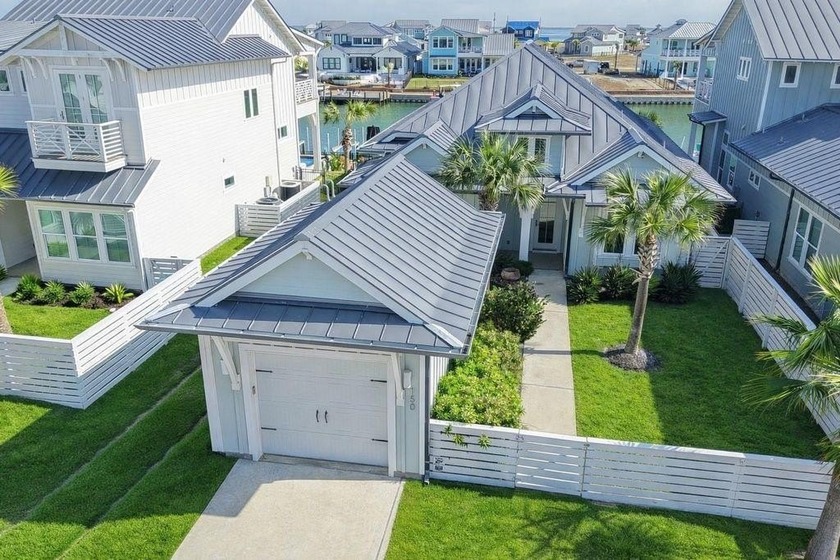 Welcome to 150 Foxtail Lane, a laid-back canal-front home in the - Beach Home for sale in Rockport, Texas on Beachhouse.com