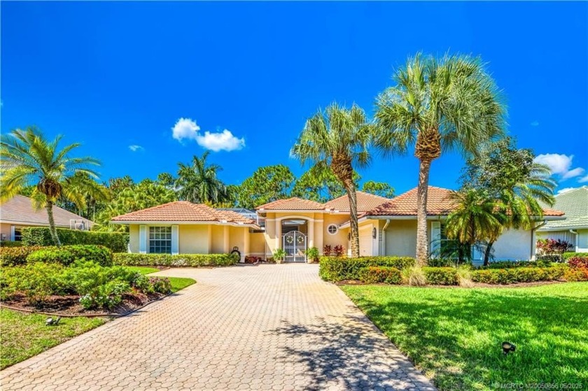Discover serene living in this beautifully designed courtyard - Beach Home for sale in Palm City, Florida on Beachhouse.com
