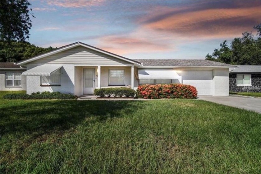 This home truly has it all! This updated 3-bedroom, 2-bath home - Beach Home for sale in New Port Richey, Florida on Beachhouse.com