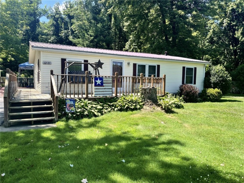 This ranch home is well maintained and boasts many updates - Beach Home for sale in Sodus, New York on Beachhouse.com