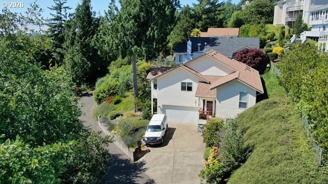 Nestled in the gated community of Rhodoview Dunes, this inviting - Beach Home for sale in Florence, Oregon on Beachhouse.com