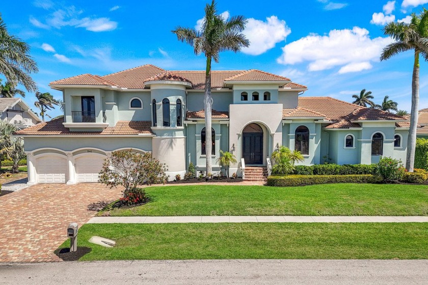 Just steps from the Gulf, this 5 bedroom plus Den palatial - Beach Home for sale in Marco Island, Florida on Beachhouse.com