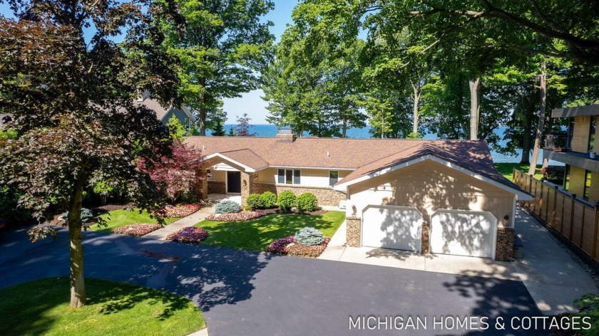 Welcome to the Good Life and your private lakefront retreat on - Beach Home for sale in Holland, Michigan on Beachhouse.com