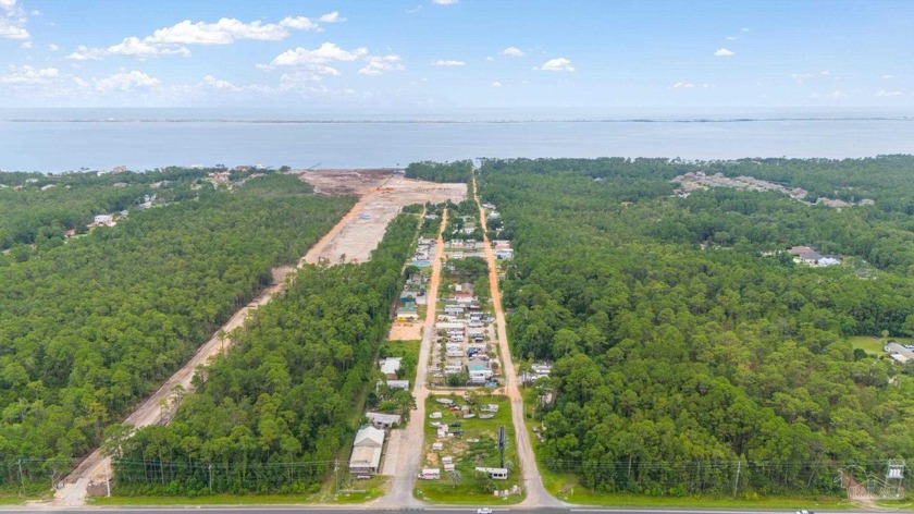 Discover a rare investment opportunity in the heart of Gulf - Beach Acreage for sale in Gulf Breeze, Florida on Beachhouse.com