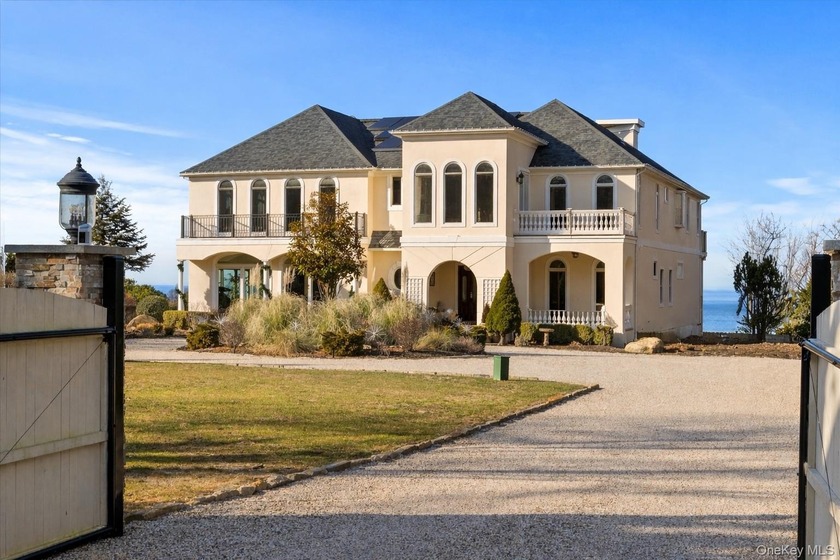 Set high above the shoreline with sweeping western views across - Beach Home for sale in Riverhead, New York on Beachhouse.com