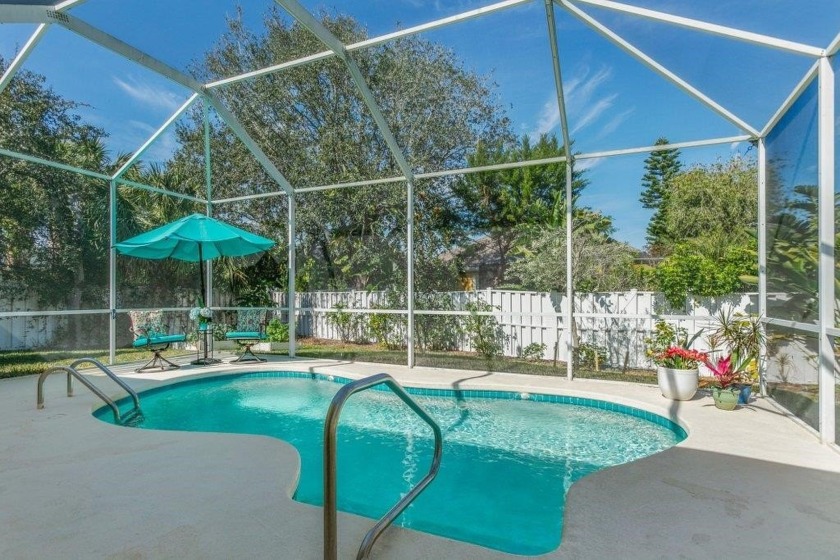 With Its Glistening Pool,Tropical Landscape And Easy Walk To The - Beach Home for sale in St Augustine, Florida on Beachhouse.com