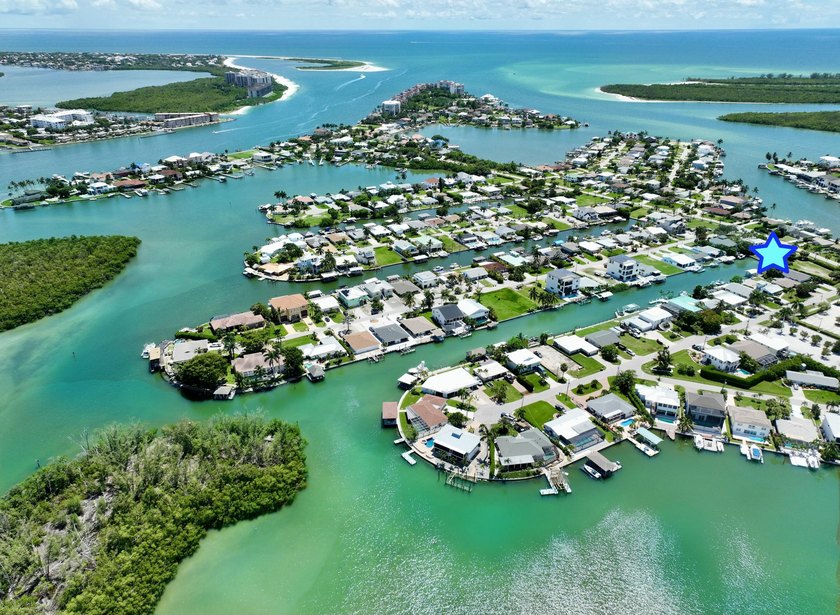 Rare opportunity to own 1 of 3 canal lots in existence that look - Beach Lot for sale in Naples, Florida on Beachhouse.com