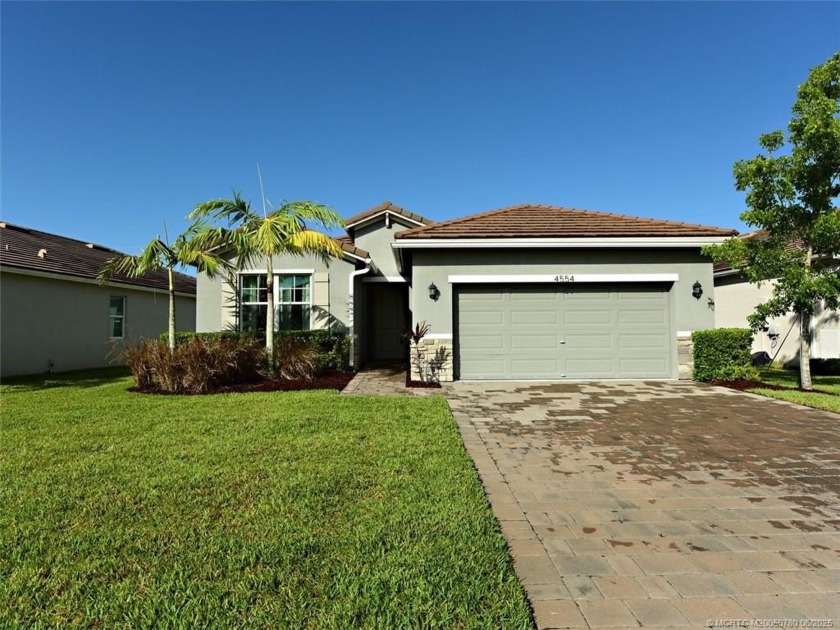 This like-new 3/2/2 home in Jensen Beach offers a perfect blend - Beach Home for sale in Jensen Beach, Florida on Beachhouse.com