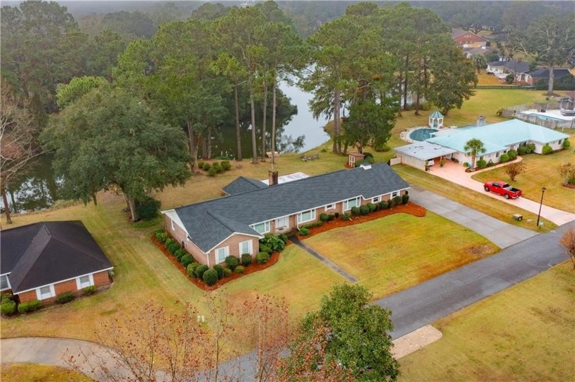 Elegant Lakefront Brick Ranch in Windward Acres  This stunning - Beach Home for sale in Brunswick, Georgia on Beachhouse.com