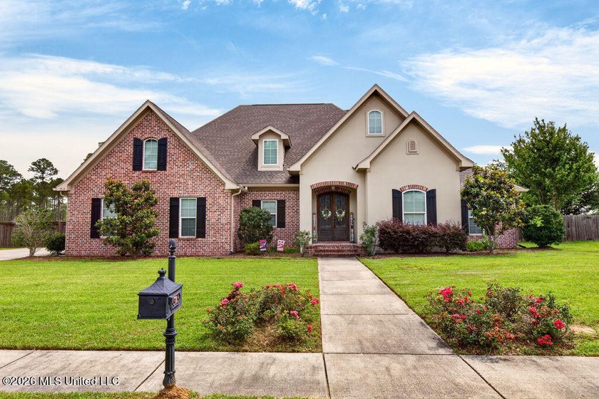 Experience refined Gulf Coast living in this exceptional - Beach Home for sale in Ocean Springs, Mississippi on Beachhouse.com