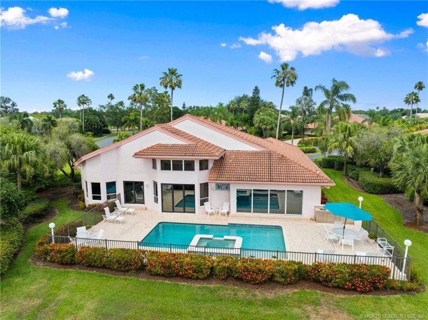 Enjoy natural light and serene views overlooking the lake, pool - Beach Home for sale in Palm City, Florida on Beachhouse.com
