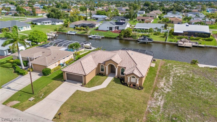 Discover the beauty of Gulf Coast living in this beautiful Gulf - Beach Home for sale in Cape Coral, Florida on Beachhouse.com