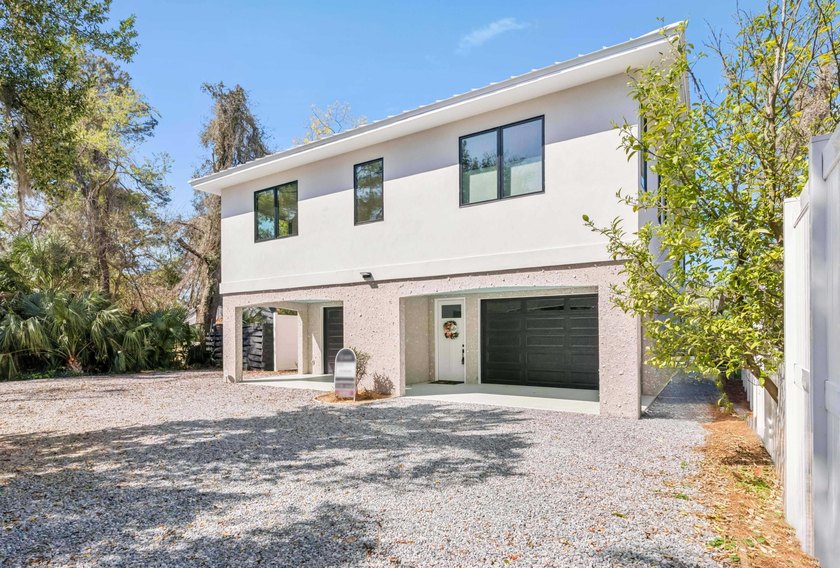 Tucked away at the end of Arnold Lane just 1/2 mile from the - Beach Home for sale in Saint Simons, Georgia on Beachhouse.com