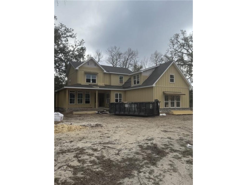 This newly constructed home in the gated Barrington Oaks offers - Beach Home for sale in Brunswick, Georgia on Beachhouse.com