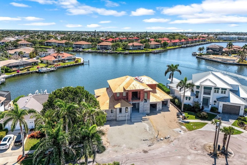 Immerse yourself in the epitome of coastal contemporary living - Beach Home for sale in Marco Island, Florida on Beachhouse.com