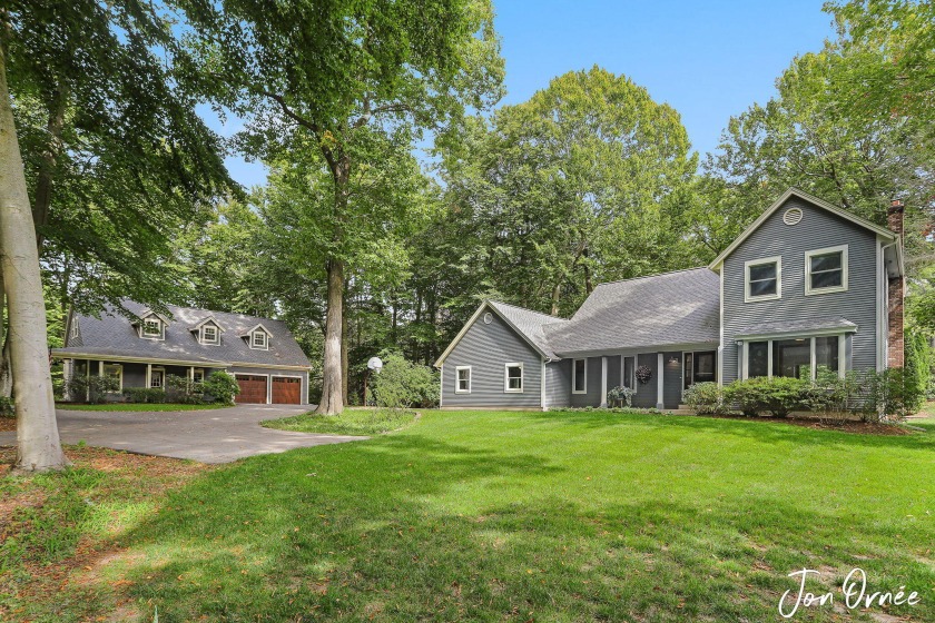 Welcome to your Lakeshore Oasis! 3.3 acres of private, wooded - Beach Home for sale in Holland, Michigan on Beachhouse.com