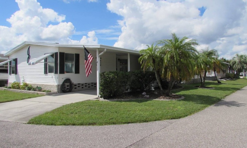 BEAUTIFUL 3 BEDROOM 2 BATH FURNISHED JACOBSEN   The living room - Beach Home for sale in Trinity, Florida on Beachhouse.com