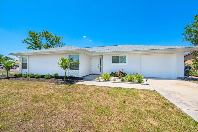Offered TURN-KEY FURNISHED, this property is fully fenced-in, on - Beach Home for sale in North Port, Florida on Beachhouse.com
