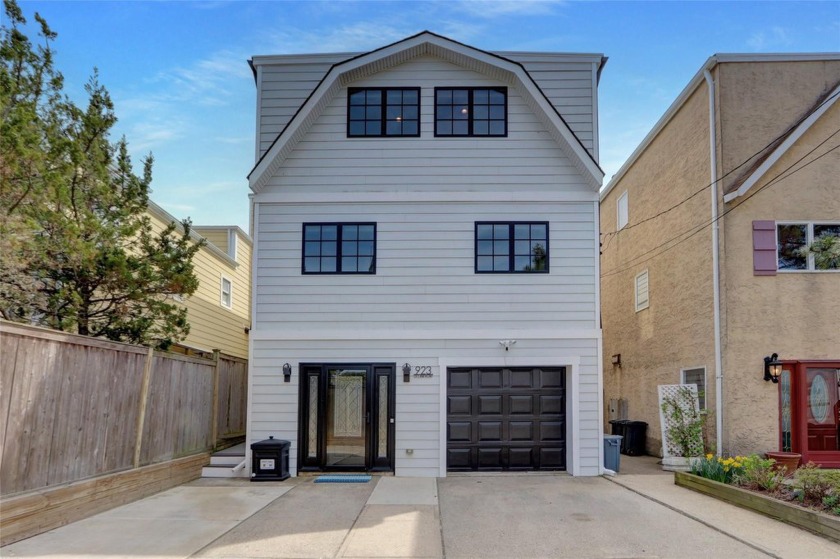 Step into coastal luxury with this impeccably updated 6-bedroom - Beach Home for sale in Long Beach, New York on Beachhouse.com