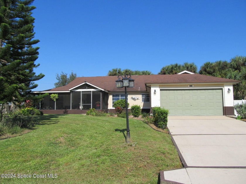 Do you need a huge yard with a home that offers many options for - Beach Home for sale in Palm Bay, Florida on Beachhouse.com