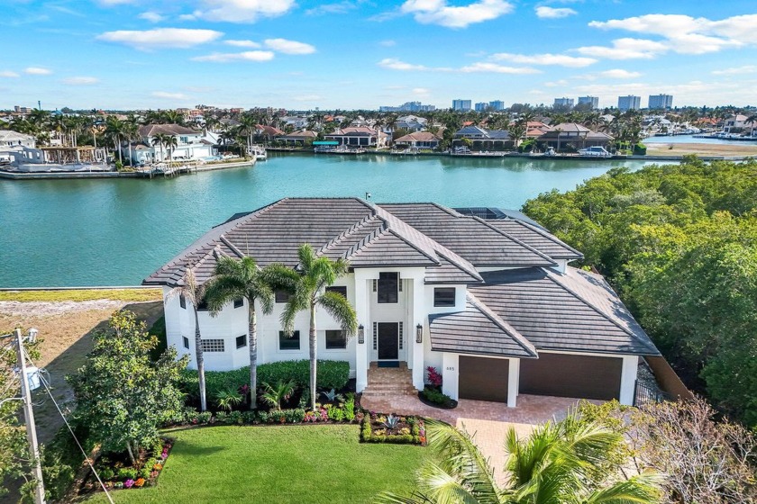 An exquisite waterfront haven on its exclusive cove, this - Beach Home for sale in Marco Island, Florida on Beachhouse.com