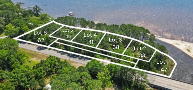 Situated on over 100' of tranquil Bay frontage in Basin Bayou - Beach Lot for sale in Freeport, Florida on Beachhouse.com
