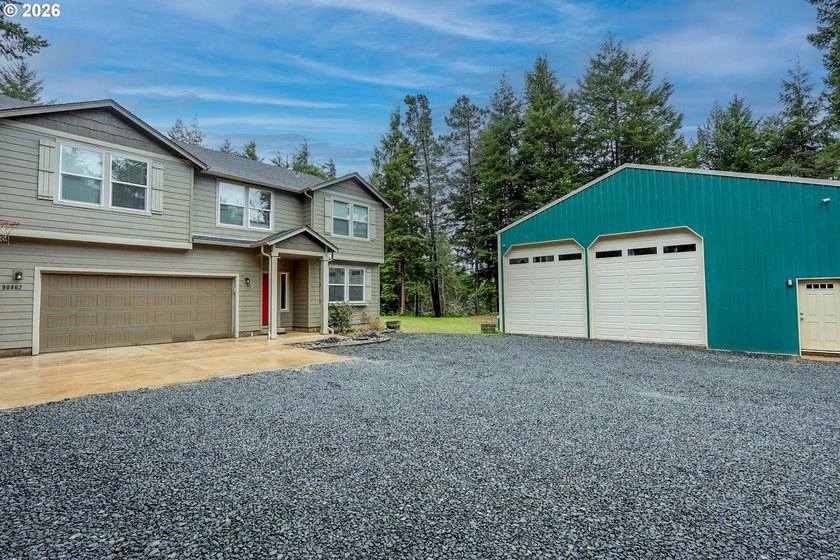 Nestled on nearly 2 private acres, this stunning 2015-built home - Beach Home for sale in Coos Bay, Oregon on Beachhouse.com