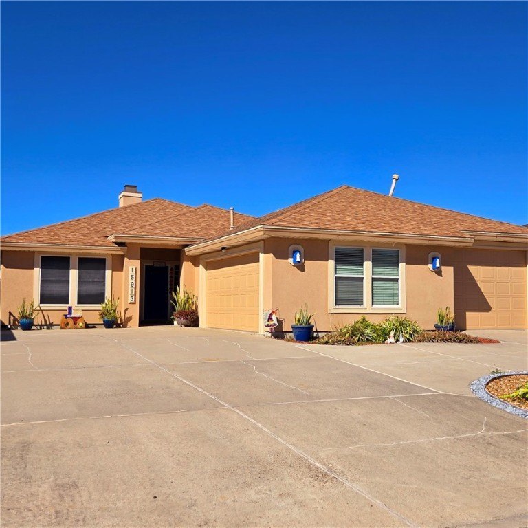 Charming waterfront oasis with an inviting open layout and - Beach Home for sale in Corpus Christi, Texas on Beachhouse.com