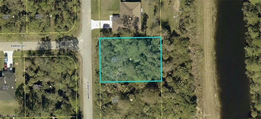 Beautiful 1/4 acre lot with rear view of canal that adds extra - Beach Lot for sale in Lehigh Acres, Florida on Beachhouse.com