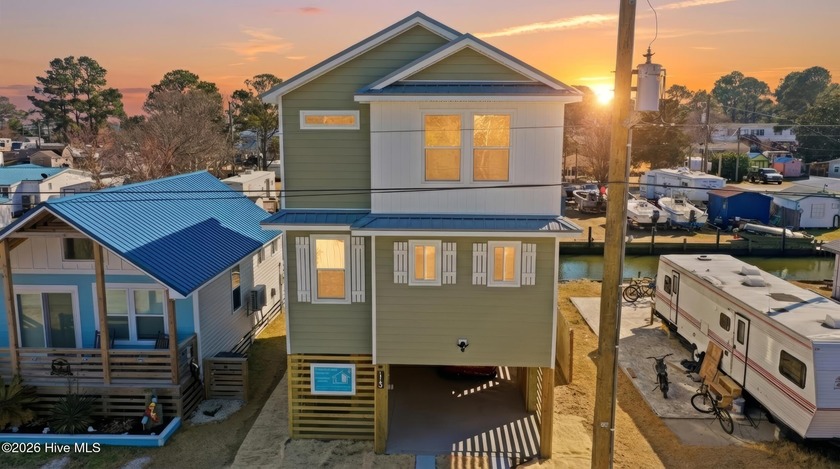 Experience the best of coastal living in this stunning new - Beach Home for sale in Grandy, North Carolina on Beachhouse.com
