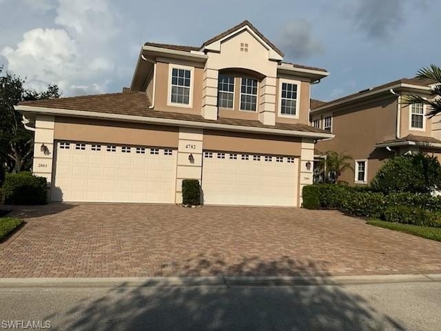 Lake front Coach Home in Premier tree-lined Golf Community 
 - Beach Home for sale in Naples, Florida on Beachhouse.com