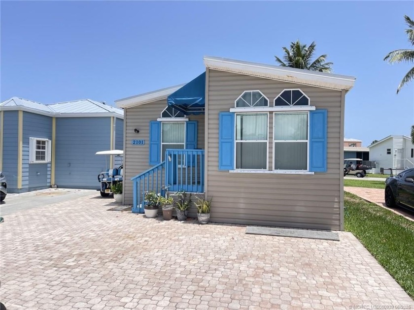This beautifully maintained 2-bedroom, 2 full bath double wide - Beach Home for sale in Jensen Beach, Florida on Beachhouse.com