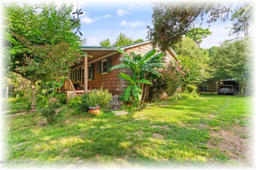 Discover your private oasis with this charming cedar sided home - Beach Home for sale in Supply, North Carolina on Beachhouse.com