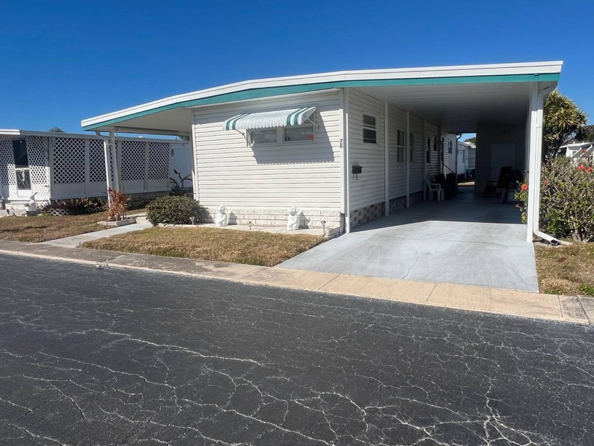 This energetic 55+ community blends an active lifestyle with - Beach Home for sale in Largo, Florida on Beachhouse.com