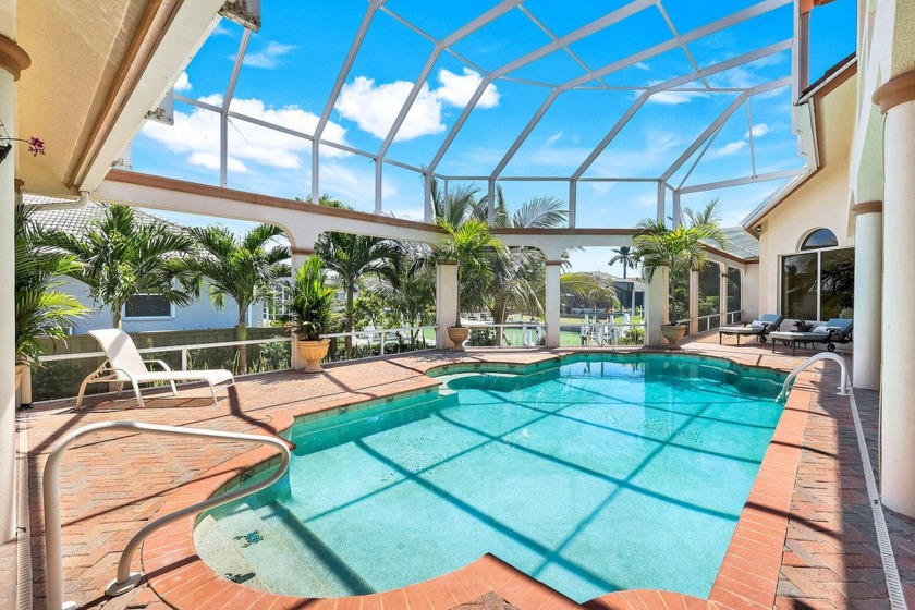 Step into an architectural masterpiece where timeless elegance - Beach Home for sale in Marco Island, Florida on Beachhouse.com
