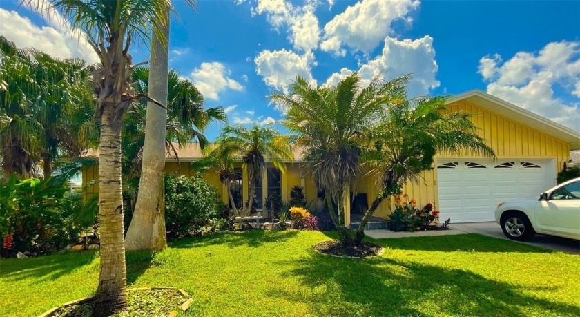 Welcome to this private waterfront oasis on a quiet street with - Beach Home for sale in Clearwater, Florida on Beachhouse.com