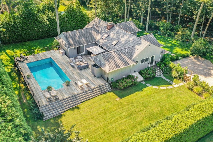 Nestled on a flag lot just off a cul-de-sac, this exquisite - Beach Home for sale in Bridgehampton, New York on Beachhouse.com