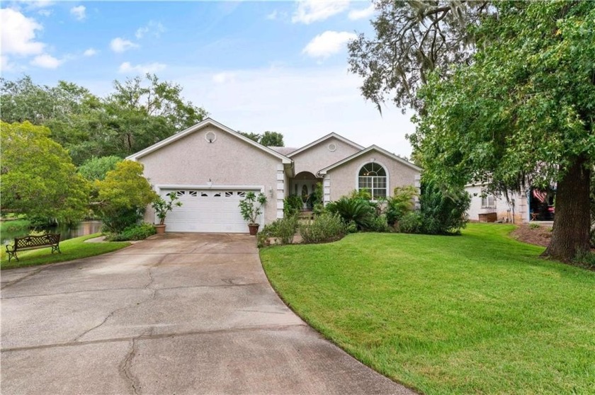 Located in the charming community of Sea Palms West, this - Beach Home for sale in Saint Simons, Georgia on Beachhouse.com